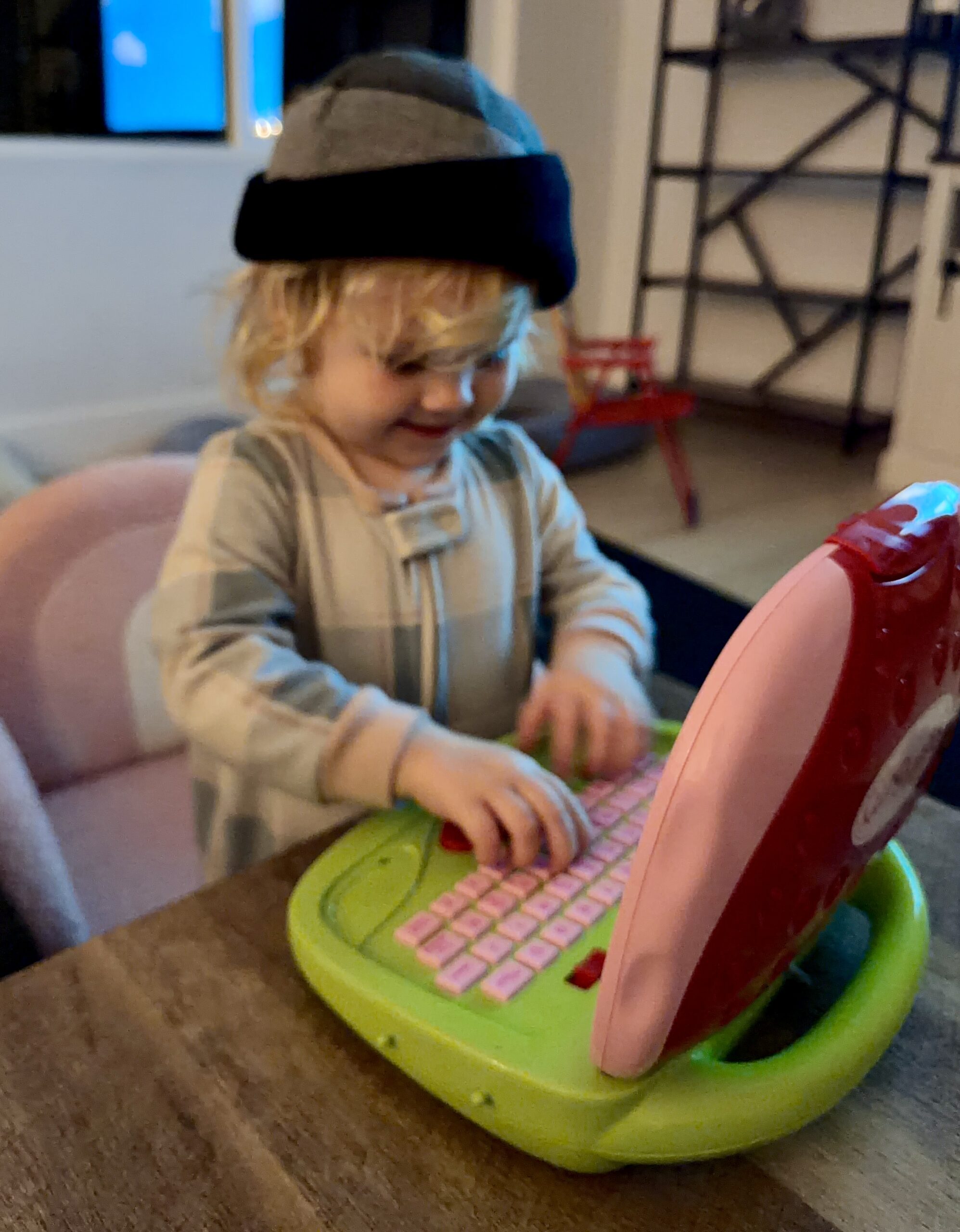 toddler watching TV on couch — 30 minutes of intentional screen time while parent cooks dinner